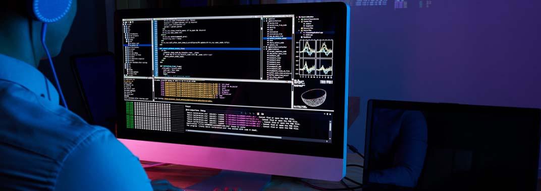 Debunking myths about learning to program Programmer in front of a compute