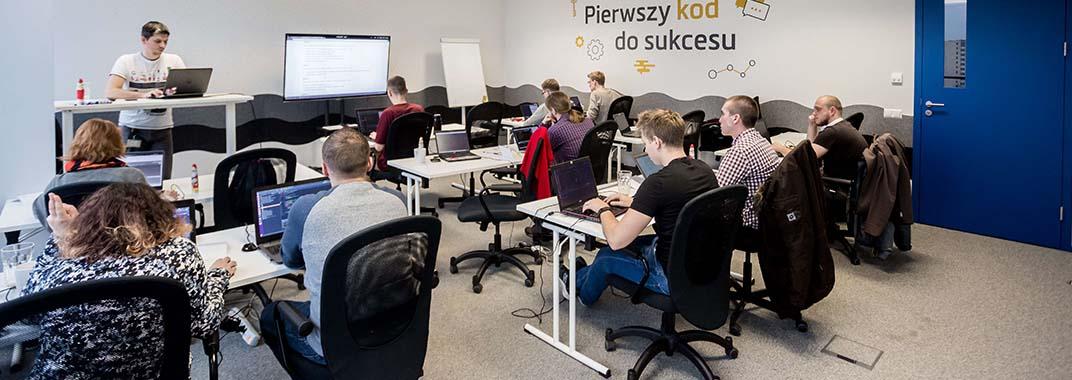 How to set up a programming school Coding students with lecturer