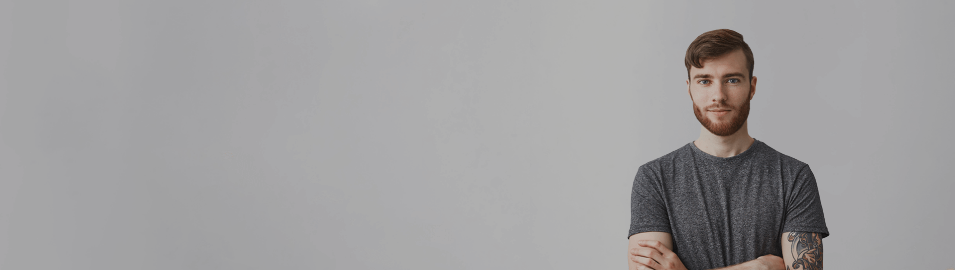 Young man with beard image Young man with beard on grey background
