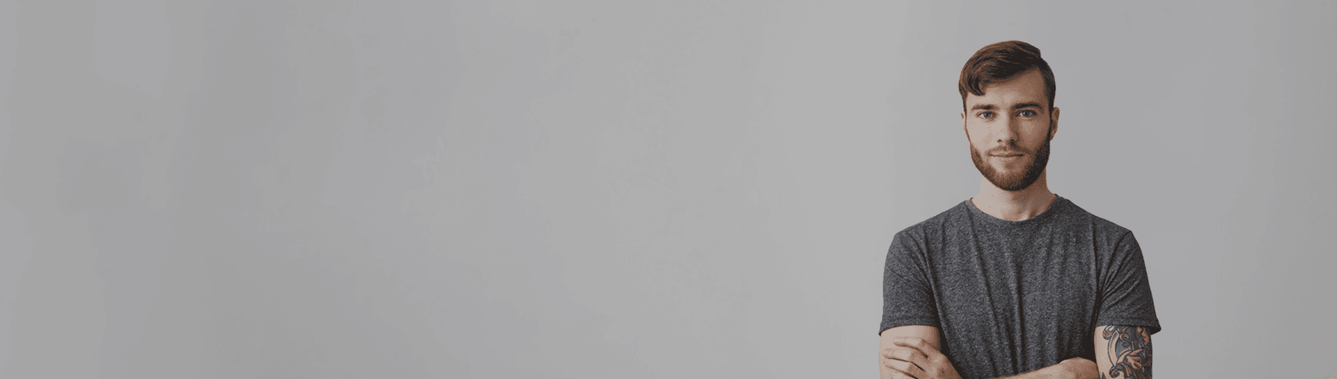 JS workshops young programmer on gray background