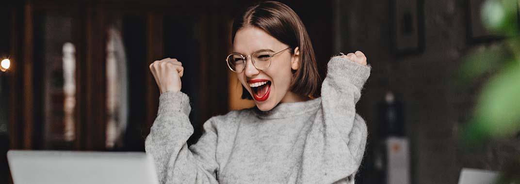 Become a programmer in 2022 Woman making gesture of success