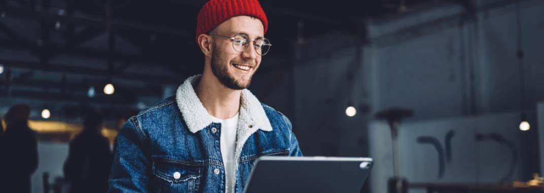 The one minute programmer Young man in front of laptop