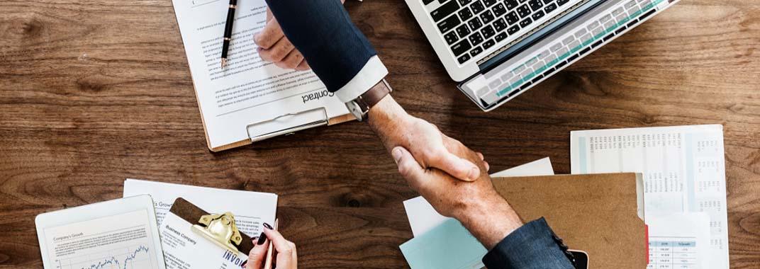 Coders Lab in Austria Business deal handshake